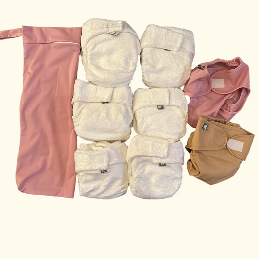 Stofbleshoppen_little_lamb_formsyede_natble_pakke_med_wetbag_og_blebukser